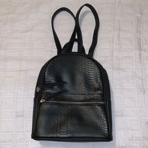 Small leather backpack